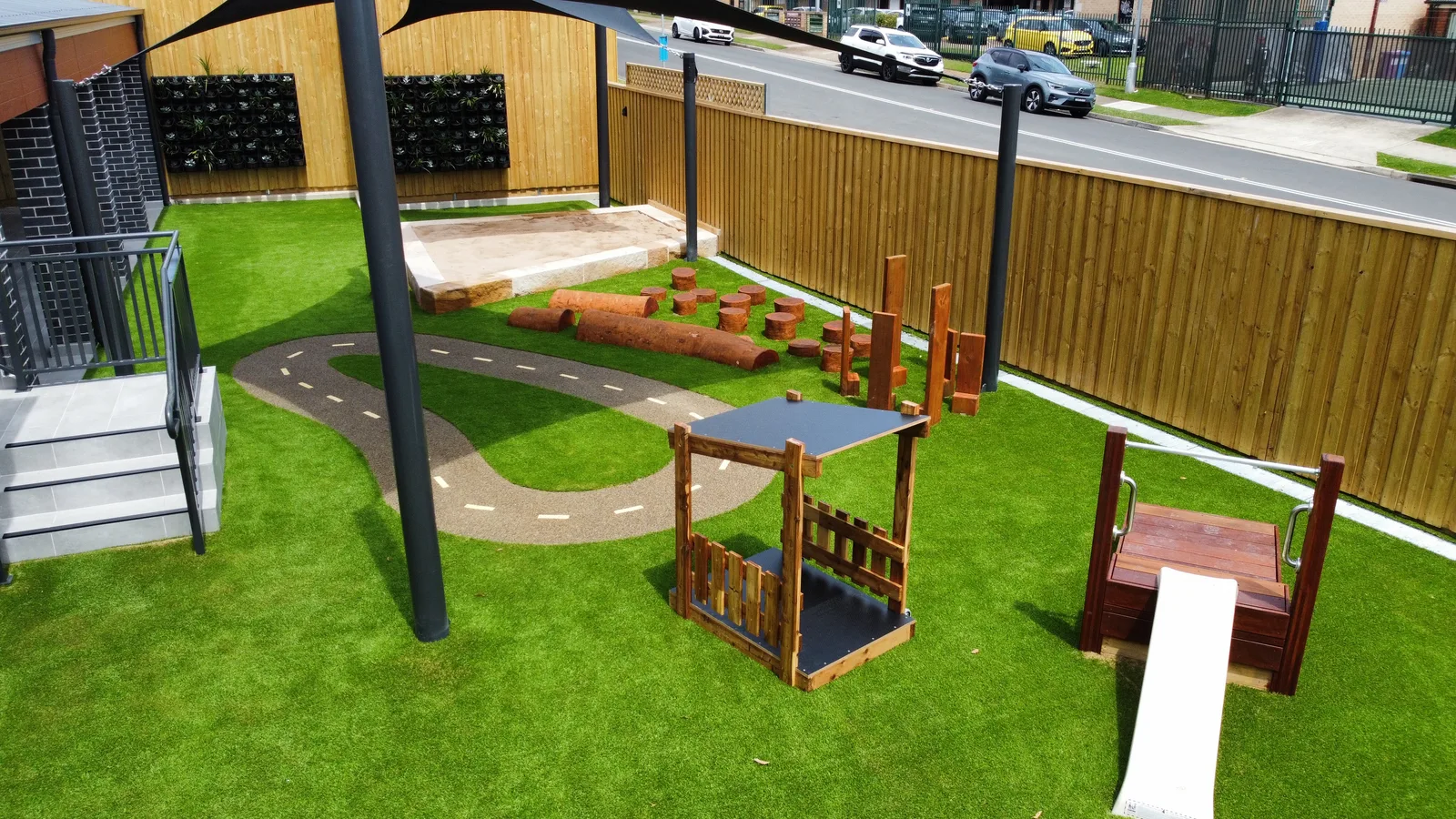 Childcare play area with synthetic lawn and rubber softfall — JL Turf Group