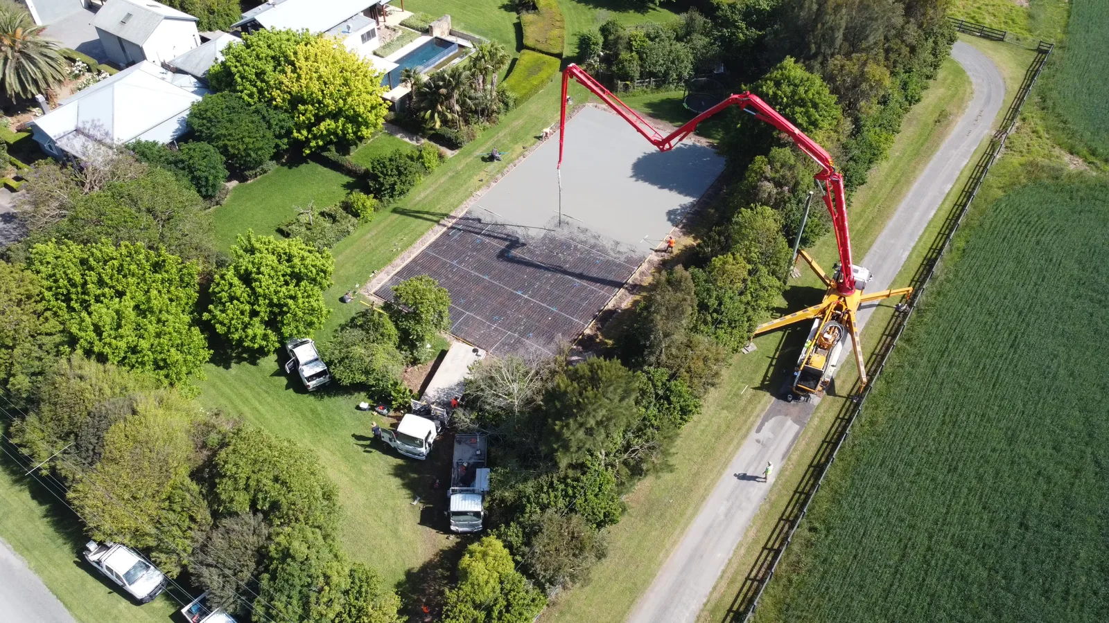 Concrete base being poured for a new sports court — JL Turf Group civil works