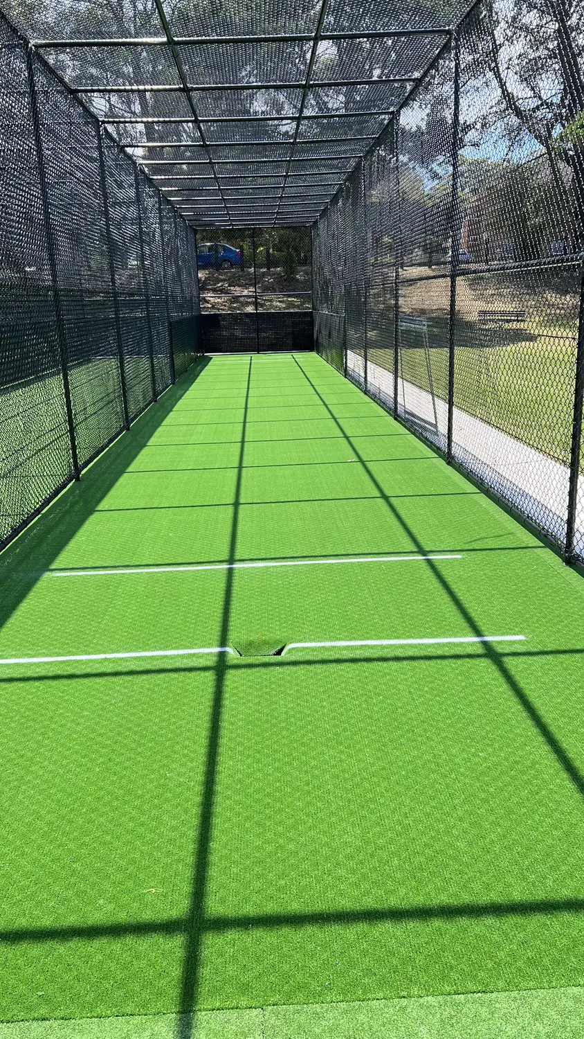 Inside a synthetic cricket practice net cage — JL Turf Group