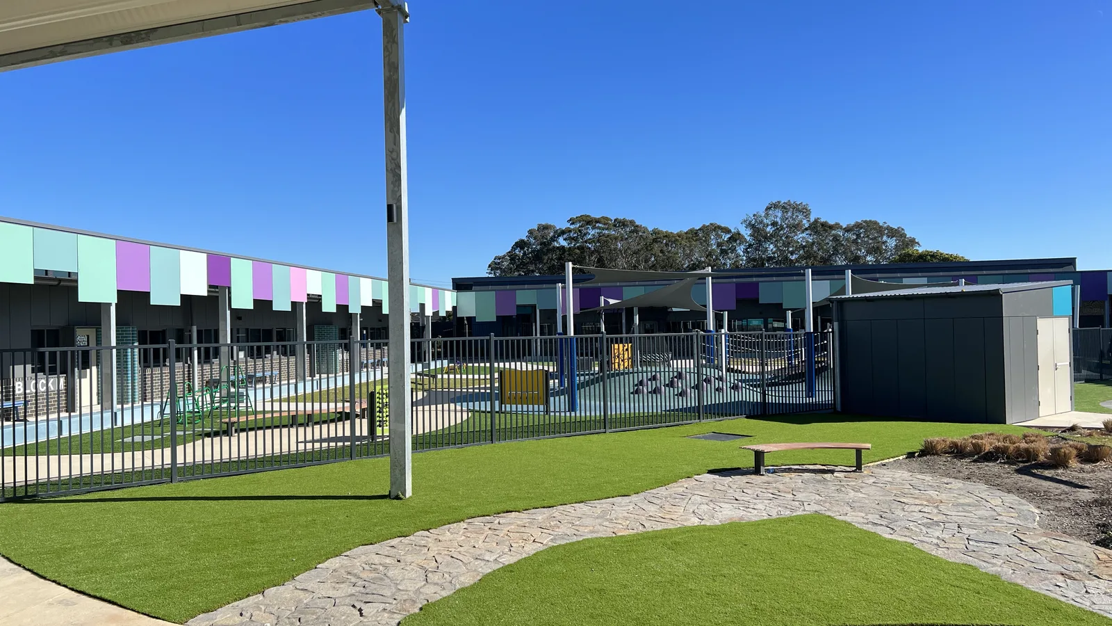 Colourful early-learning play yard with synthetic surfaces — JL Turf Group
