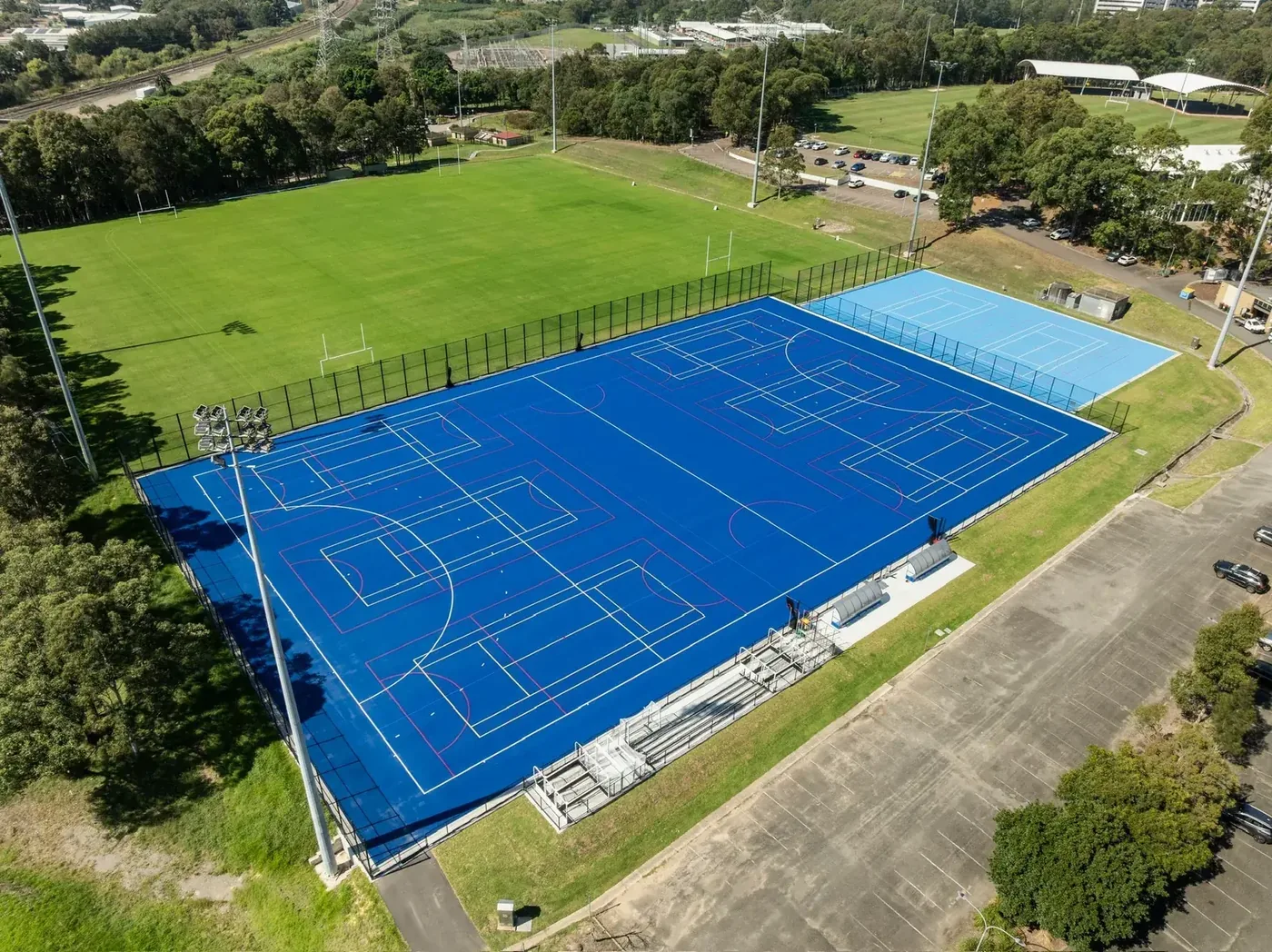 Aerial view of a multi-sport institutional court built by JL Turf Group