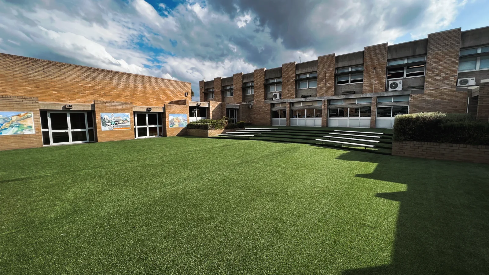 Synthetic lawn courtyard area at a school — JL Turf Group