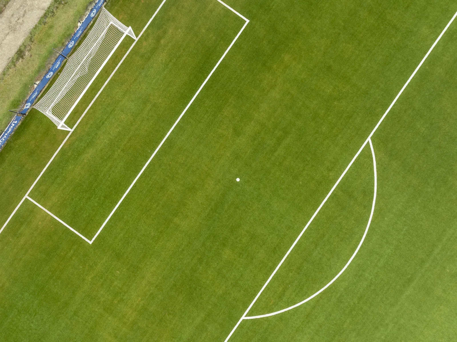 Close view of a synthetic football pitch goalmouth and line marking — JL Turf Group