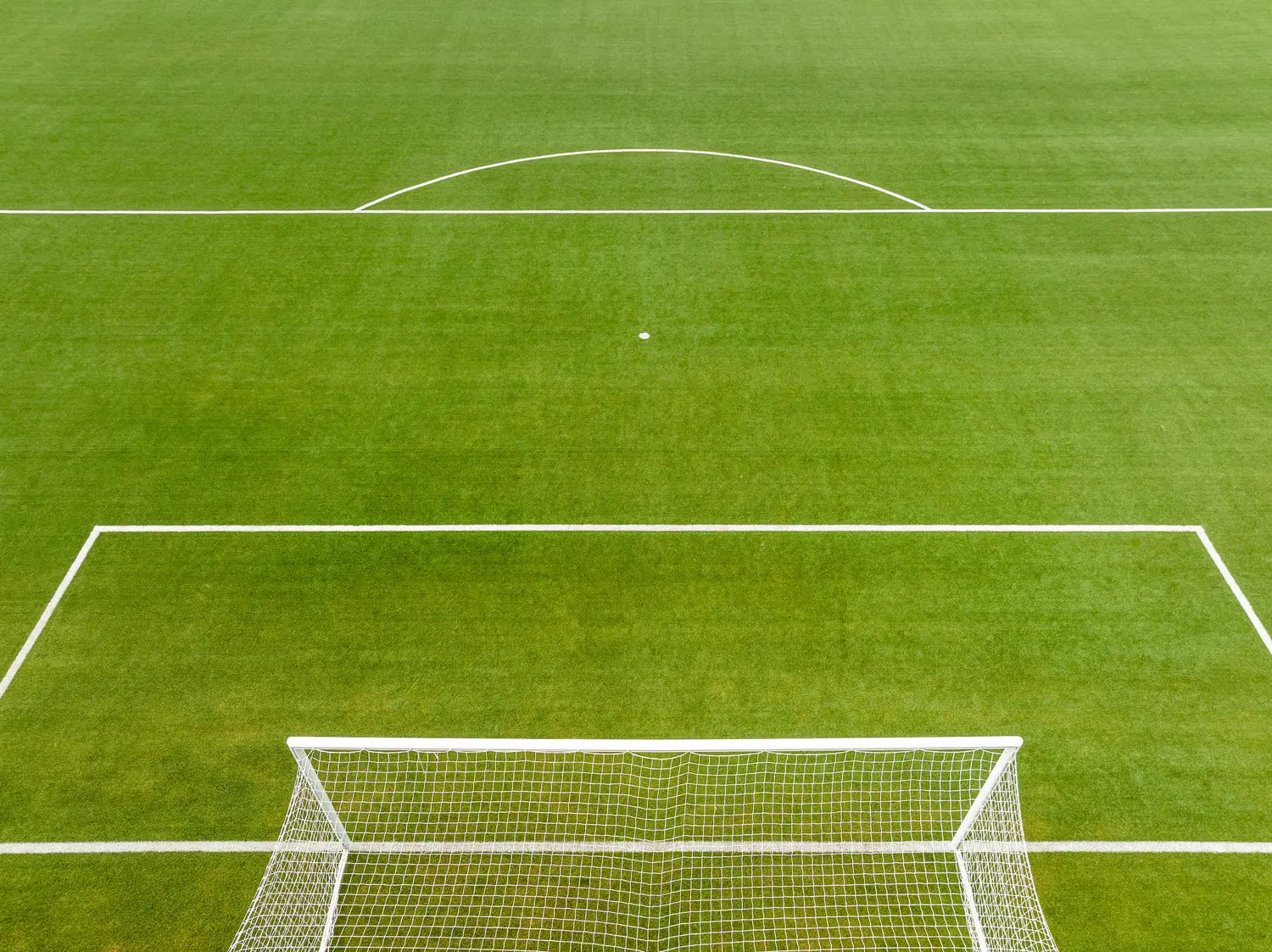Detail of a synthetic football pitch surface and markings — JL Turf Group